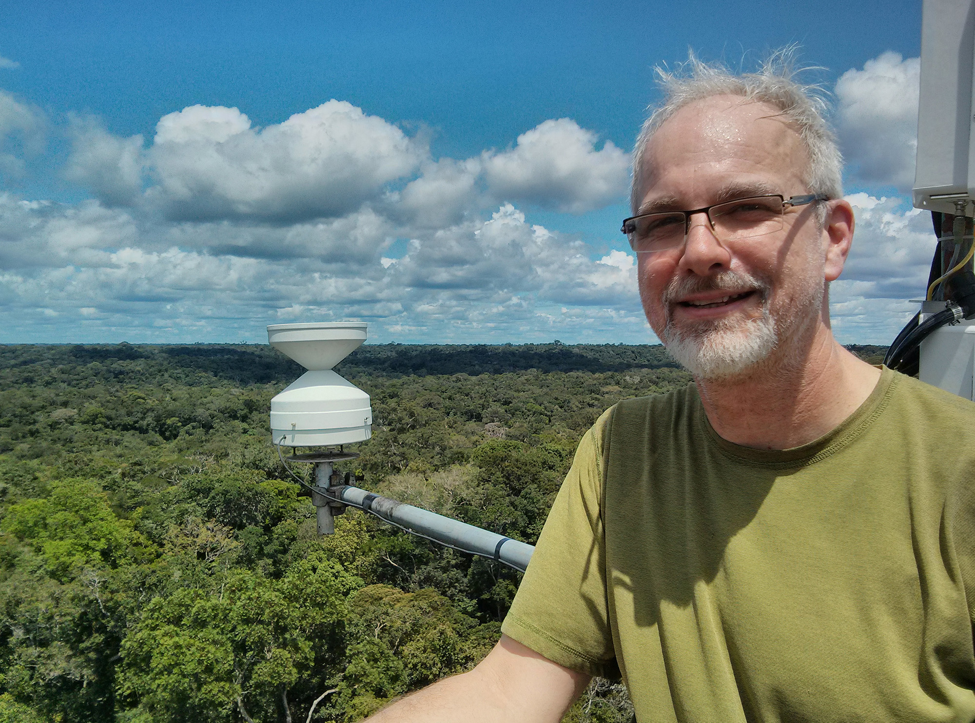 Jim Smith, a University of California, Irvine, expert in ultrafine aerosol particles, ascended an observation tower in Brazil in 2015 to study the kinds of particles formed from forest canopy emissions. At the time, he worked at the National Center for Atmospheric Research in Boulder, Colorado. Photo courtesy of Jim Smith. 